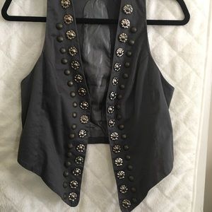 Studded vest.